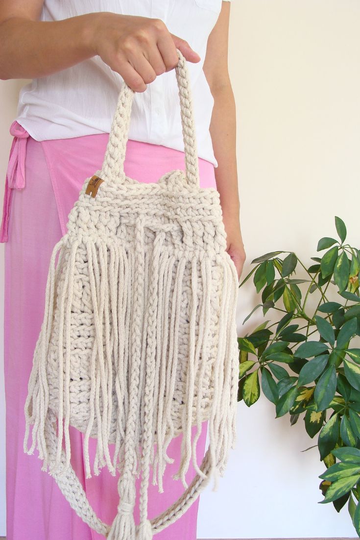 Boho fringe handbag. White Fringed Shoulder Bag For Beach, White Fringed Bag For Summer, Trendy Crochet Bag With Tassels For Beach, Bohemian Summer Shoulder Bag With Fringe, Bohemian Bucket Bag With Braided Handles, Daily Tassel Crochet Tote Bag, Tote Crochet Bag With Tassels For Daily Use, Daily Use Tote Crochet Bag With Tassels, Casual Crochet Tote Bag With Tassels