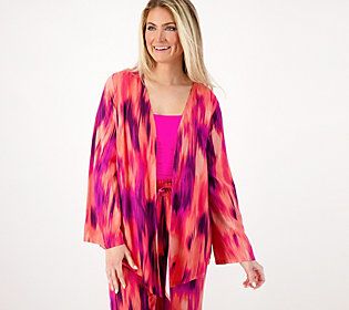 A go-with-the-flow fashion statement with UPF 30 protection, this cascading topper creates a multitude of sunny day styles from a poolside cover up to a lush layer for tanks. From AmberNoon II by Dr. Erum Ilyas. Summer Casual Cover-up For Layering, Upf 50+ Spring Vacation Cover-up, Pink Cover-up For Poolside Spring, Spring Vacation Cover-up With Upf 50+, Pink Cover-up For Spring Poolside Events, Spring Beachwear Pink Cover-up, Spring Pink Poolside Cover-up, Pink Spring Poolside Cover-up, Spring Beachwear Cover-up With Upf 50+