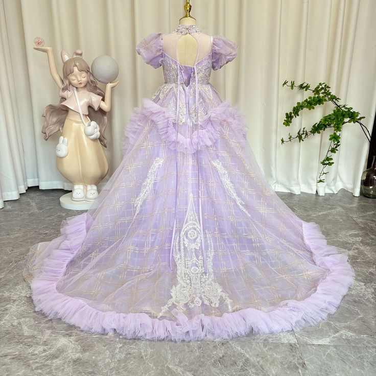 Add a touch of elegance to your little girl's special day with our Dreamy Luxury Beaded Lilac Girl Dress. Perfect for birthdays, weddings, and other special occasions, this dress features intricate beading and luxurious fabric for a truly stunning look. Made with care and high-quality materials for lasting comfort and style. Organza Floor-length Ball Gown For Quinceanera, Princess Organza Gown For Prom, Princess Style Lavender Party Gown, Princess Lavender Gown For Party, Princess Style Lavender Gown For Party, Princess Organza Dress For Debutante Ball, Princess Ball Gown For Wedding And Prom Season, Princess Style Organza Dress For Debutante Ball, Lavender Tulle Dress For Quinceanera