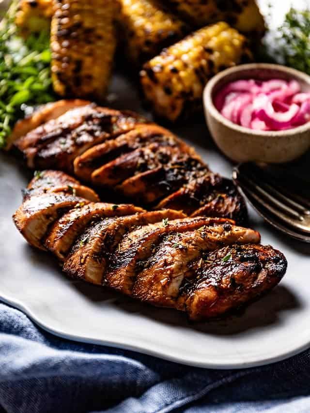 grilled meats and vegetables on a plate with the words turkey enmelon