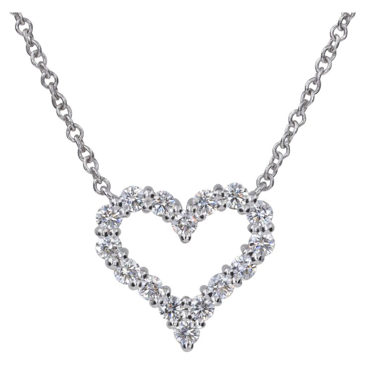 Tiffany & Co. Platinum and Diamond Heart Pendant Necklace The perfect little heart necklace for layering or worn by itself. .25 Carats of fine quality round brilliant cut diamonds set in platinum. Chain length: 16' Heart Dimensions: 11mm H x 11.60mm W Diamond Necklace Pendant Tiffany & Co., Diamond Pendant Tiffany & Co., Luxury Classic Heart Solitaire Necklace, Diamond Heart Necklace Tiffany & Co., Luxury Heart Cut Brilliant Solitaire Necklace, Diamond Pendant Necklace Tiffany & Co., Tiffany&co Necklace, Classic Heart Pendant Solitaire Necklace With Diamond Accents, Classic Solitaire Heart Pendant Necklace With Diamond Accents