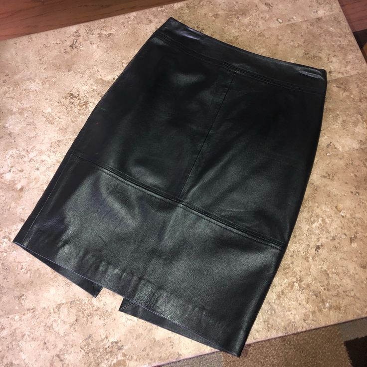 Fabulous H&M Black Leather Skirt 100% Real Leather Lined On The Inside All Throughout Zipper On The Back Hits Around The Knee! Size 8 Brand New Never Worn Before! Purchased In Europe. Made In India. Bundle And Save!! Offers Are Always Welcome! (Everything Listed Comes From My Own Closet And Home! They Have All Been Handled Very Delicately, Kept Very Safe And Clean In An Always Smoke And Pet Free Home! I Never Buy To Resell!) H&m Black Skirt For Night Out, H&m Fitted Skirt For Fall, H&m Fall Skirt For Workwear, Elegant H&m Skirt For Night Out, Fitted H&m Skirt For Fall, H&m Mini Skirt For Fall Workwear, Elegant Fitted H&m Skirt, Elegant Fitted Skirt By H&m, H&m Fitted Mini Skirt For Work