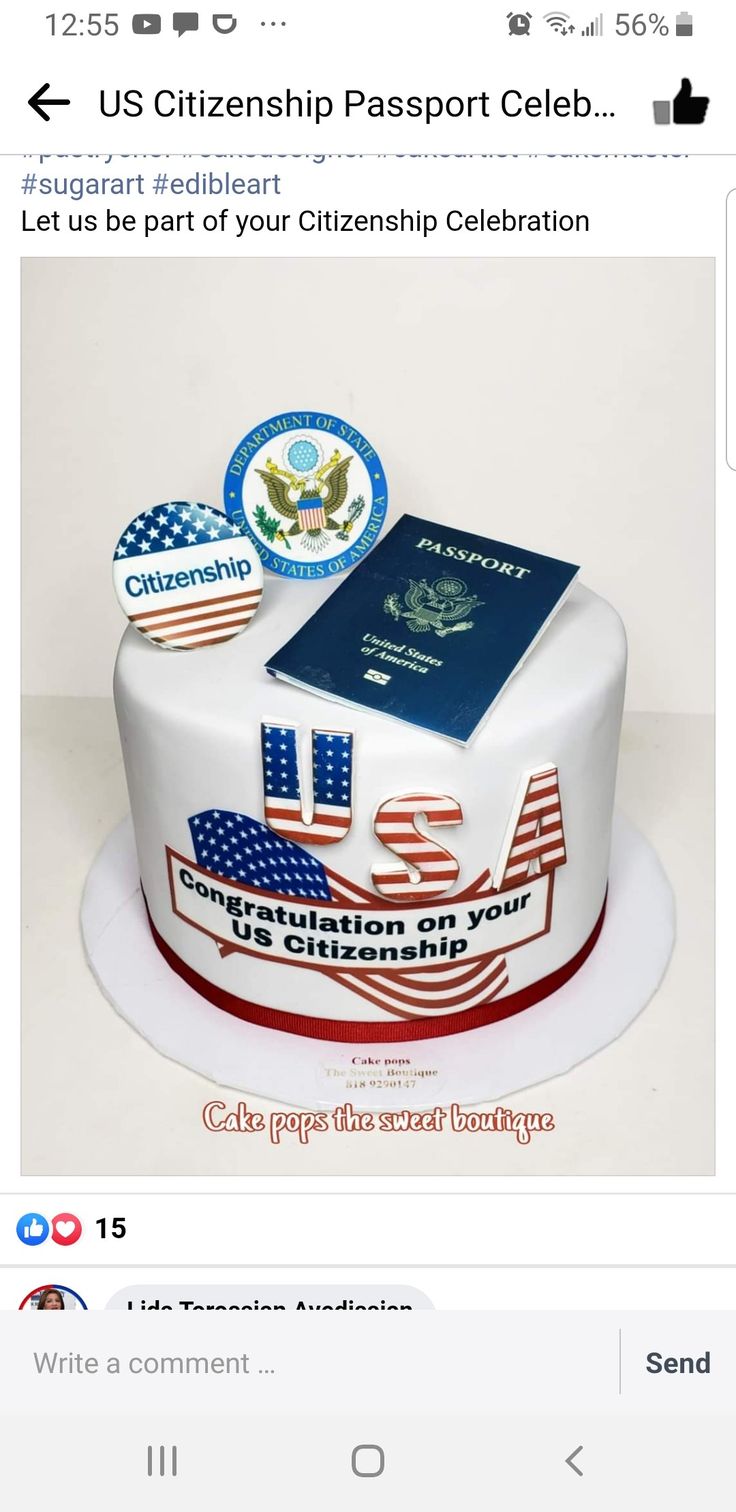 a white cake with an american flag and passport on top