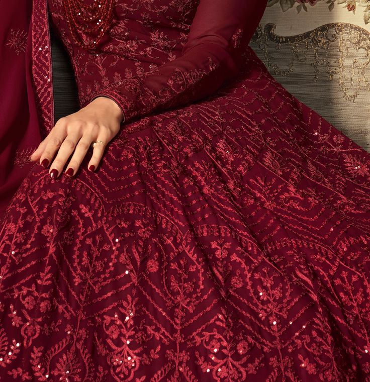 Ruby Red Designer Heavy Embroidered Wedding Anarkali Suit-Saira's Boutique Red Semi-stitched Anarkali Set For Reception, Floor-length Red Salwar Kameez For Reception, Red Churidar With Intricate Embroidery For Reception, Red Churidar With Dabka Work For Reception, Red Fitted Churidar With Intricate Embroidery, Red Anarkali Gown With Resham Embroidery, Floor-length Georgette Churidar For Wedding, Red Anarkali Churidar For Wedding, Fitted Georgette Churidar For Wedding