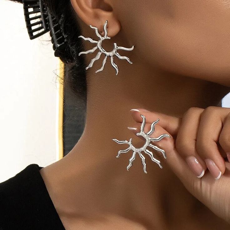 Available in silver and gold finishes. Metal Sunflower, Shell Game, Stud Earrings For Women, Girls Best Friend, Silver And Gold, Earrings Jewelry, Earrings For Women, Amazing Jewelry, Vintage Metal