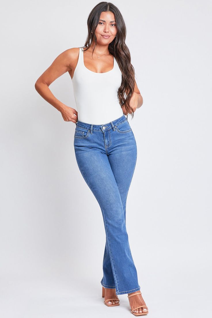 Give your old jeans the boot and scoot into our Women’s Mid-Rise Bootcut Jeans. Constructed with midweight stretchy denim, this stylish mid-waisted jean is fitted from the hip through the thigh and flares out slightly from knee to hem for a dreamy bootcut silhouette. Detailed with a classic five-pocket construction, a zip fly with button closure, and the cutest flap back pockets with snap buttons. Style with your favorite fitted top and sassiest boots for a look that’ll make a statement. Product