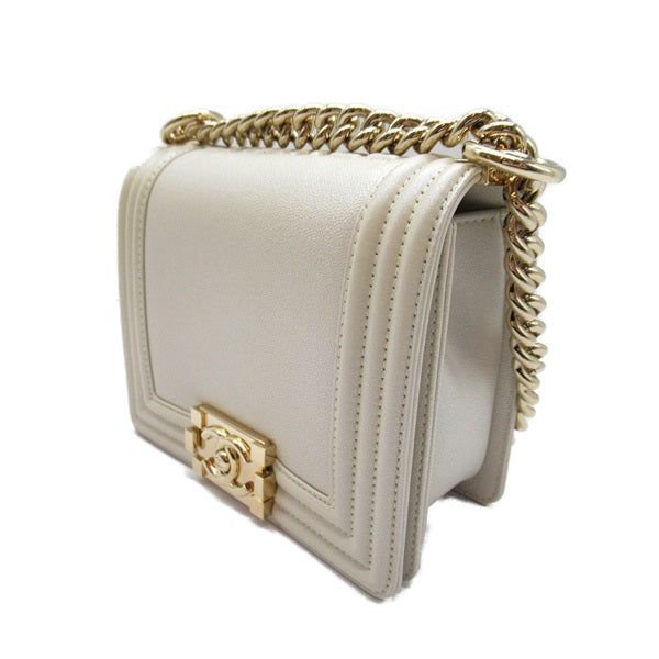 This Mini Boy Bag features a White Leather. Assured Product ity: This product is supplied by a renowned and trusted partner. With this purchase you are preserving iconic craftsmanship celebrating heritage and embracing the beauty of sustainable shopping. Luxury Flap Bag As Gift, Luxury Top Handle Flap Bag Gift, Luxury Top Handle Flap Bag As Gift, Classic Satchel With Gold-tone Hardware As Gift, Luxury Rectangular Flap Bag For Gift, Luxury Rectangular Flap Bag Gift, Classic Top Handle Flap Bag For Gift, Classic Flap Bag With Top Handle As A Gift, Luxury Square Flap Bag As Gift