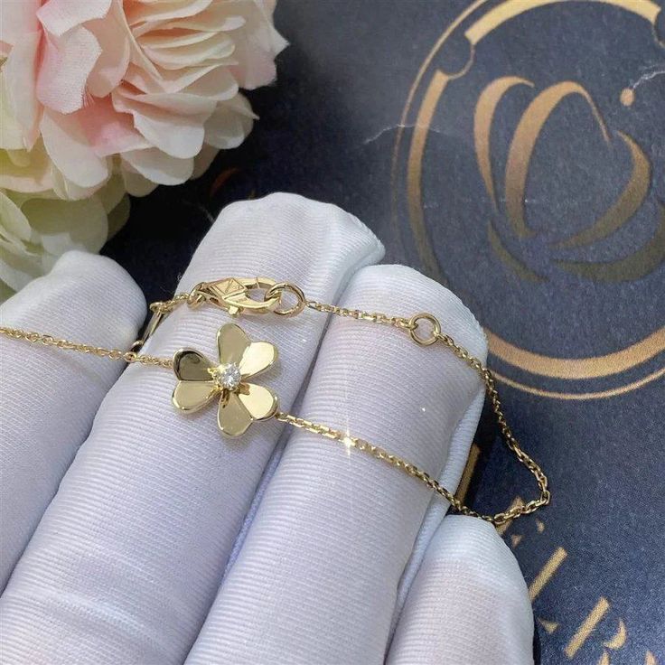 Add a touch of elegance to your wardrobe with the Frivole Gold Flower Bracelet. Crafted with intricate floral details, this bracelet exudes sophistication and charm. Made with high-quality materials, it is the perfect accessory for any occasion. Elevate your style with the Frivole Gold Flower Bracelet. ADDITIONAL INFORMATION Color: Gold Stone: Cubic Zirconia Ref. vcaro3 Material:- 925 Sterling Silver - 18k Gold Plated- 18k Real Gold ( contact us via instagram) Circumference: 17cm Our replica pro Gold Flower Bracelet, Trinity Bracelet, Detailed Jewelry, Gold Stone, Flower Bracelet, Gold Flower, Love Bracelets, Love Necklace, Gold Flowers