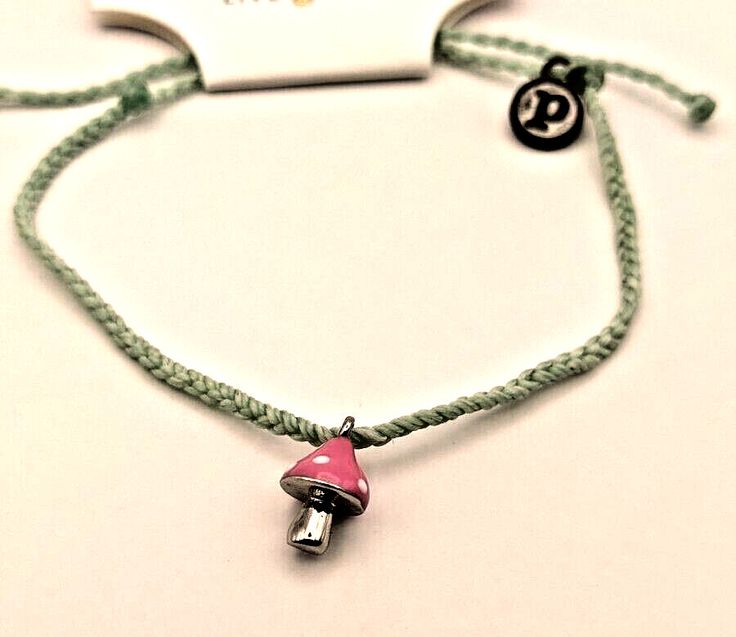 PURA VIDA NWT 1 BRACELET HTF Cute pink mushroom charm on moss green string bracelet. Please contact me 1st if there is an issue with your order so I can resolve it. Be aware that shipping USPS can take 1 to 2 weeks to arrive. See my other listings, I will combine shipping. Adjustable Pink Braided Bracelets For Beach, Pura Vida Miami, Charms For Bracelets Pura Vida, Green Pura Vida Bracelet, Mermaid Jewelry Pura Vida, Pink Mushroom, Pura Vida Bracelets, String Bracelet, Moss Green