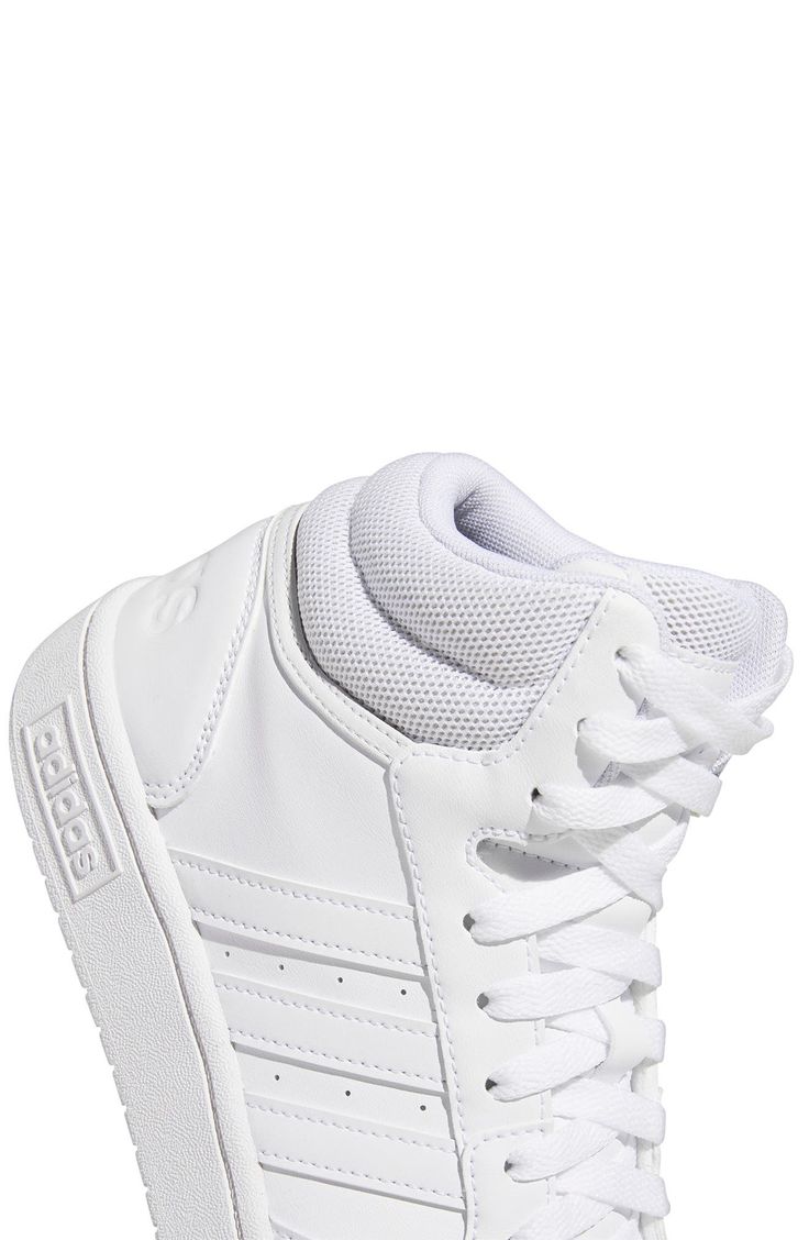 Signature brand logo 3-stripe detail meets a pair of mid top sneakers with a lace-up closure for a street inspired look. Round toe Lace-up style Cushioned insole White sole Synthetic leather upper, rubber sole Imported Mid Top Sneakers, Mid Top, Adidas Superstar Sneaker, Classic Sneakers, White White, Up Styles, Synthetic Leather, White Sneaker, Top Sneakers