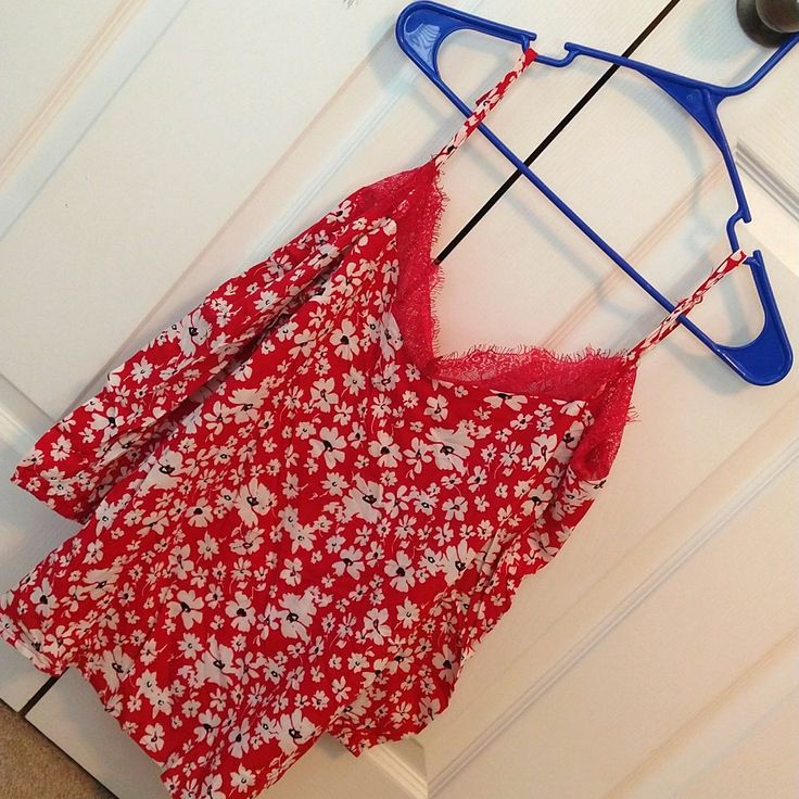 Women's Blouse With Cut Out Shoulders. Super Cute And Flattering. Adjustable Spaghetti Straps, Lace Detail Around Collar, Red With White Flower Pattern. This Is Brand New, Never Worn, Without Tags. It Is A Size Medium But Fits Like A Small. It Is 65% Polyester And 35% Cotton. Red Floral Print Top With Spaghetti Straps, Red Floral Print Tops With Spaghetti Straps, Red Floral Print Spaghetti Strap Tops, Red Spaghetti Straps Top With Floral Print, Casual Red Camisole For Spring, Red Summer Loungewear Tops, Red Tops For Summer Loungewear, Red Floral Print Tank Top For Spring, Red Floral Print Cami Top