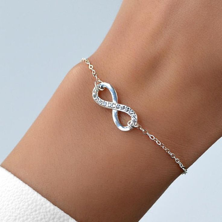 This simple, but elegant chain bracelet is beautifully delicate and features an Infinity Symbol. It's the perfect gift for your best friend, your mom, girlfriend, or even yourself! Wear the Crystal Stainless Steel Infinity Bracelet as your daily affirmation, inspiration, and reminder, that you are loved! This quality bracelet is crafted of hypoallergenic stainless steel. It's completely adjustable and can be fitted to most wrist sizes. Show your love with this beautiful Crystal Infinity Bracelet