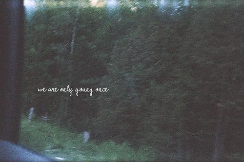 a blurry photo with the words we are always young on it