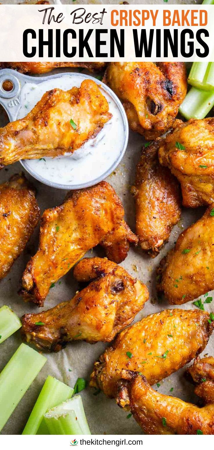 image: crispy baked chicken wings and celery sticks with ranch dressing in vintage measuring cup. Title text: The Best Crispy Baked Chicken Wings How To Make Wings Crispy In Oven, Healthy Baked Wings Oven, Baked Chicken Wings Oven Easy, Crispy Oven Baked Chicken Wings Corn Starch, Oven Fried Chicken Wings Baking Soda, Over Baked Chicken Wings, Baked Chicken Party Wings Recipes, Bone In Chicken Wings Oven Baked, Chicken Wings In Oven Recipes