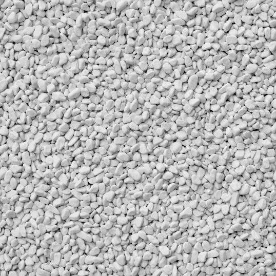 a close up view of the texture of a white carpet with small rocks on it