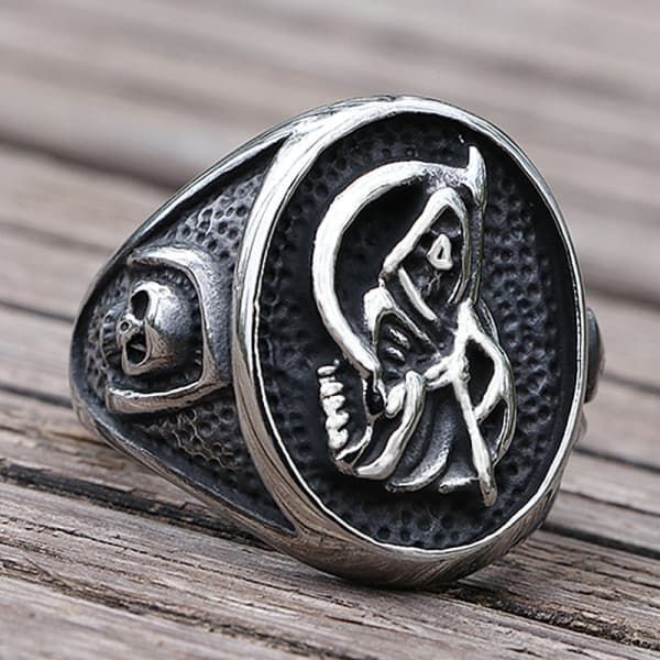 Surface Width: 23mm Shape pattern: Skeleton Ring Size: 7,8,9,10,11,12 Other Style: Fashion, Cool, Vintage, Biker, Viking, Nordic Occasion: Wedding, Anniversary, Engagement, Gift, Party Material: Stainless Steel Item Type: Rings Gender: Men and Women Fine or Fashion: Fashion Unlock the Spiritual Power: Santa Muerte Ring Embrace the mystique of the Santa Muerte ring, crafted from durable stainless steel with a unique design featuring Santa Muerte's charm. Learn about its historical roots and moder Handmade Vintage Rings For Halloween, Handmade Vintage Halloween Rings, Vintage Black Rings For Halloween, Halloween Engraved Skull Ring Gift, Silver Symbolic Skull Ring For Halloween, Black Stainless Steel Rings For Halloween, Symbolic Rings As Halloween Gifts, Halloween Black Stainless Steel Ring, Symbolic Stainless Steel Skull Ring As Gift