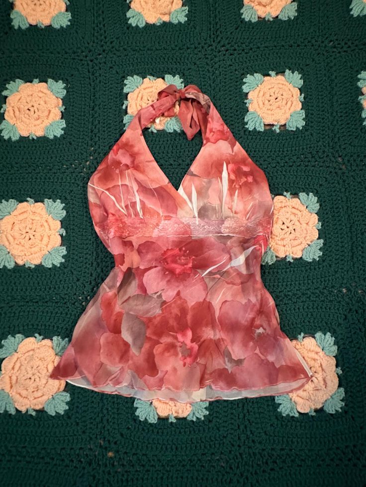 Adorable pink floral top. Brand- Charlotte Russe. Size- small. Halter tie closure, pretty pink pattern. Great vintage condition! Red V-neck Halter Top For Spring, Summer Pink Tops With Floral Print, Pink Floral Print Top For Summer, Pink Floral Print Tops For Summer, Spring Y2k Halter Neck Top, Y2k Spring Halter Neck Top, Y2k Style Spring Halter Neck Top, Summer Pink V-neck Halter Top, Y2k Style Spring Halter Top