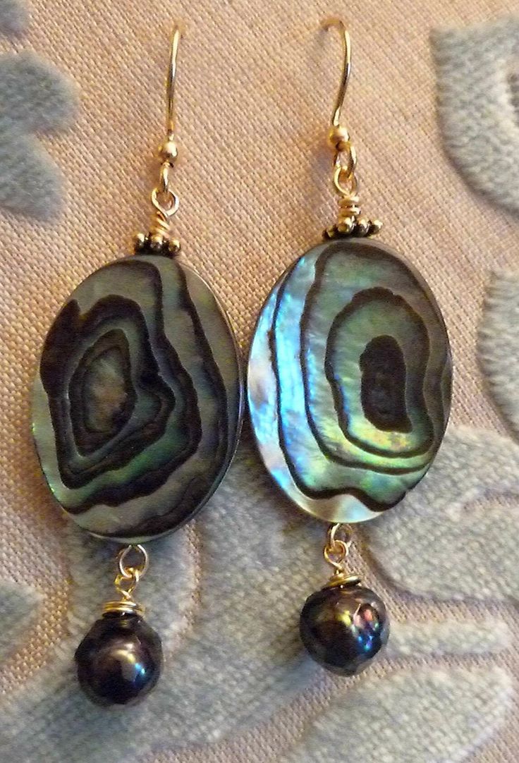 oºૐºooºૐºooºૐºooºૐºo These are adorable eye catching earrings! Can be worn with just about any color since the abalone will reflect the colors you have on. Created with sterling silver or 14k gold filled wire and handcrafted ear hooks These earrings are approx: 1 1/2 inches in length total. Iridescent Mother Of Pearl Jewelry With Matching Earrings, Handmade Dangle Earrings With Abalone Shell, Handmade Iridescent Mother Of Pearl Earrings, Abalone Shell Dangle Earrings With Matching Set, Elegant Nickel-free Abalone Shell Jewelry, Elegant Handmade Iridescent Earrings, Abalone Shell Earrings For Pierced Ears As A Gift, Gift Abalone Shell Earrings For Pierced Ears, Gift Abalone Shell Earrings