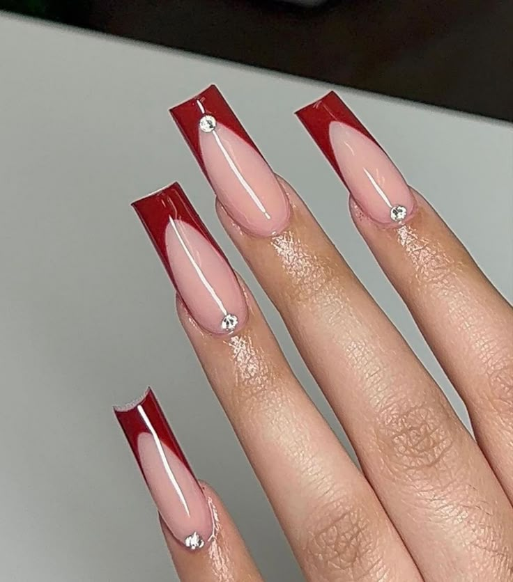 Long French Design Nails, Red Tip Nails With Rhinestones, Dark Red French Tip Nails With Gems, Red Square Nails With Rhinestones, Nail Ideas Red French Tips, Red French With Rhinestones, Red Nails Acrylic Design Simple, Pink Base Red French Tip, Red Nails Ideas Simple