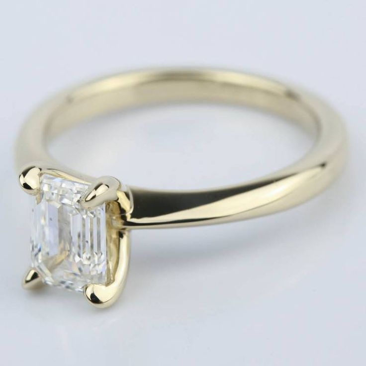 Knife Edge Emerald Cut Diamond Solitaire Ring (1 Carat) in plain yellow gold setting Elegant Asscher Cut Emerald Ring In 14k Gold, Luxury Solitaire Emerald Cut Diamond Ring, Elegant Radiant Cut Emerald Ring In 14k Gold, Elegant 14k Gold Emerald Ring For Formal Occasions, Elegant Yellow Gold Emerald Anniversary Ring, Elegant Gia Certified Diamond Ring For Proposal, Elegant Gia Certified Diamond Proposal Ring, Classic Gia Certified Rings For Proposal, Elegant Gia-certified Diamond Proposal Ring