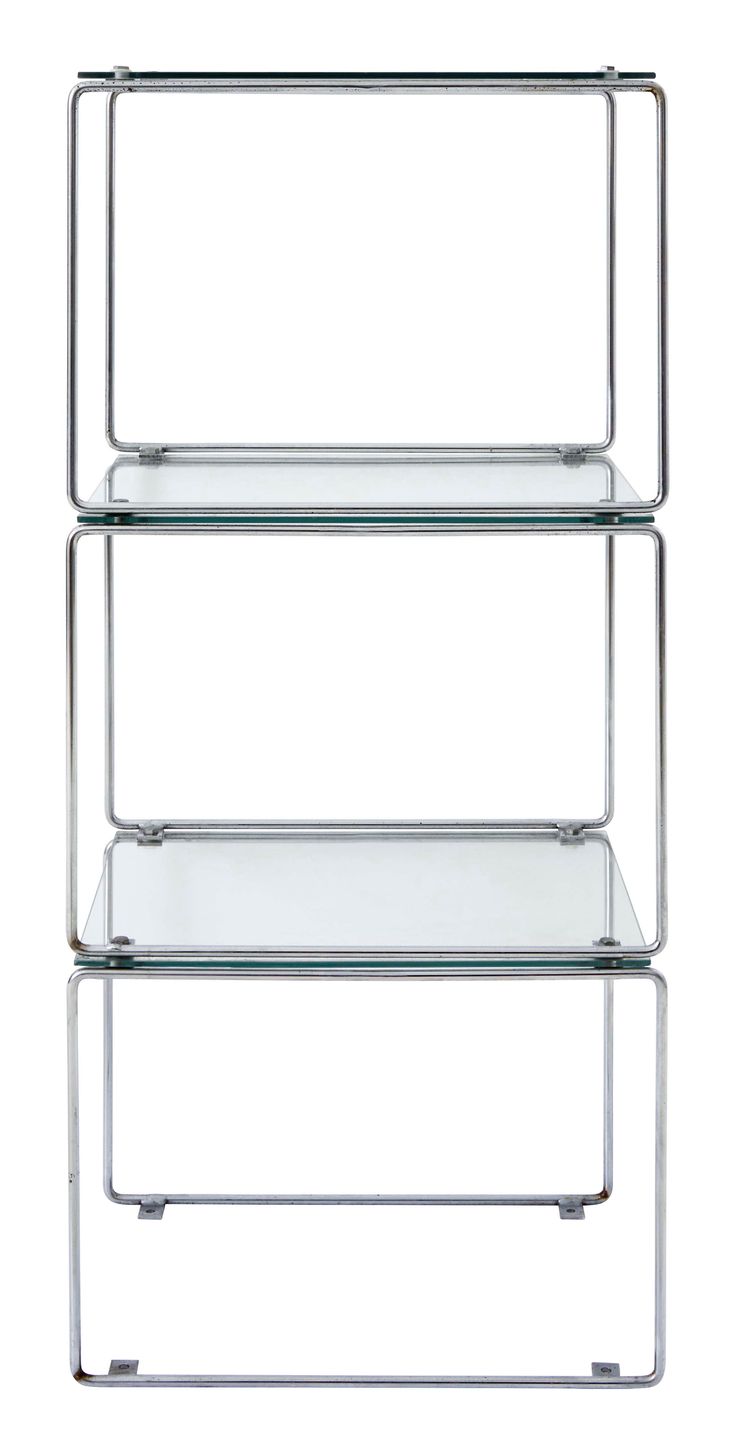 three glass shelves stacked on top of each other