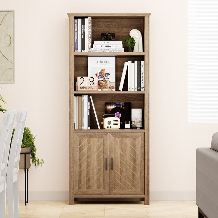 a living room with a couch and book shelf