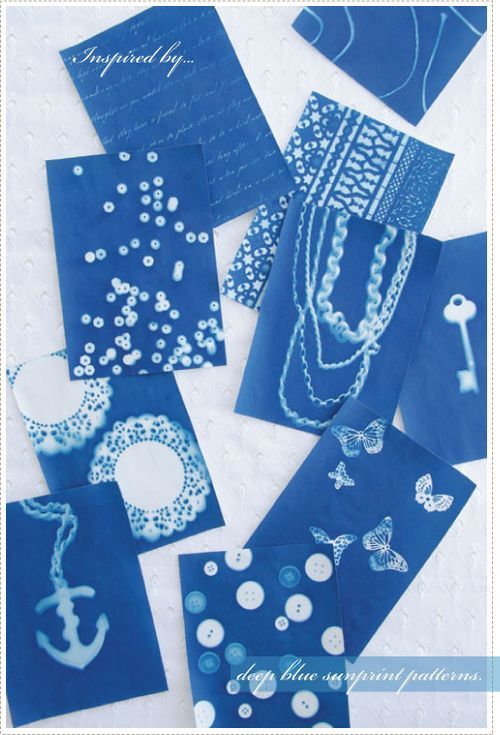 some blue cards with white designs on them