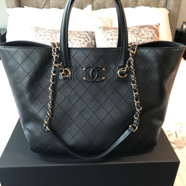 Large Chanel Shopping Bag In Great Condition. High-end Tote Bag With Branded Hardware, Luxury Tote Shoulder Bag With Branded Hardware, High-end Black Bags With Branded Hardware, Luxury Shopping Bag With Branded Hardware, Luxury Black Satchel With Double Handle, High-end Black Bag With Removable Pouch, Luxury Black Double Handle Satchel, Luxury Black Bag With Detachable Handle, Luxury Black Shoulder Bag With Top Carry Handle