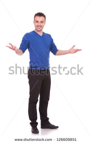 a young man standing with his hands out and smiling at the camera, on a white background