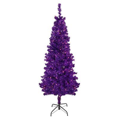 a purple christmas tree on a white background