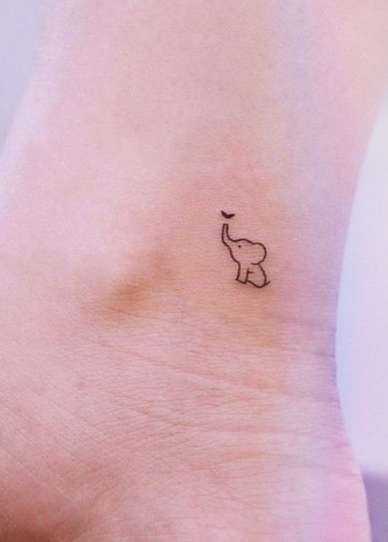 small elephant tattoo on the ankle