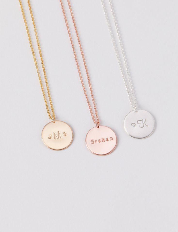 CHRISTMAS ORDER DEADLINES (WITHIN USA): Standard shipping by 12.15 Priority shipping by 12.17 Express shipping by 12.20 13mm disc necklace that can be hand-stamped on one side with your choice of initials, name, or date - endless possibilities. Modern and simple, this little piece will become a staple in your everyday jewelry collection. D E T A I L S * Disc size is approximately 13 mm * Available in 14k gold fill, sterling silver, or 14k rose gold fill * This listing is for one disc necklace P Customizable Rose Gold Charm Necklaces With Round Pendant, Customizable Rose Gold Charm Necklace With Round Pendant, Customizable Rose Gold Round Pendant Charm Necklace, Customizable Round Rose Gold Charm Necklace, Personalized Round Disc Charm Necklace For Anniversary, Personalized Rose Gold Round Disc Charm Necklaces, Rose Gold Hand Stamped Charm Necklaces With Round Shape, Rose Gold Hand Stamped Round Charm Necklaces, Customizable Sterling Silver Round Disc Necklace