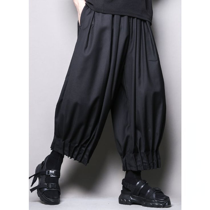 Loose Pleated Pleated Nine-point Pants – stylesock Stretch Wide Leg Parachute Pants For Fall, Baggy Full Length Pants With Elastic Waistband, Baggy Solid Color Cargo Pants, Fall Stretch Wide Leg Parachute Pants, Baggy Solid Cargo Pants, Solid Oversized Wide Leg Bottoms, Baggy Trousers For Fall, Fitted Tapered Leg Parachute Pants For Fall, Oversized Solid Wide Leg Bottoms