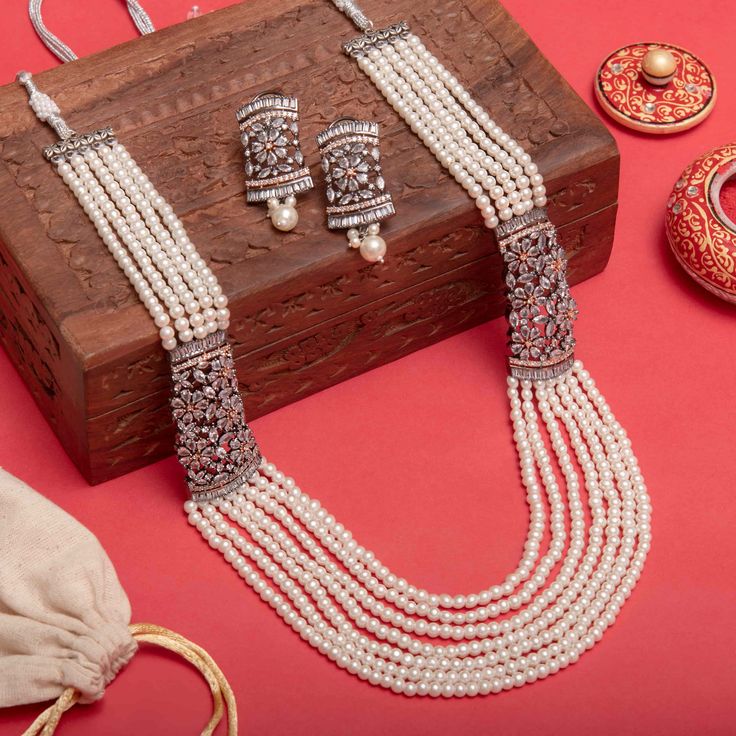 Online Desi Jewelry featuring pearl long necklace with CZ broaches on both sides. Perfect for Indian and Pakistani jewelry. Ad Necklace Set, Aqua Bag, Pearl Long Necklace, Indian Jewelry Set, Ad Necklace, Long Necklace Set, Necklace Set Indian, Traditional Indian Jewellery, Polki Jewellery