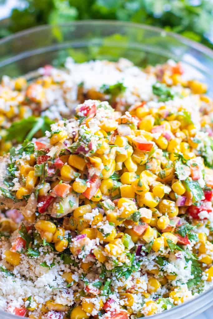 mexican street corn salad in a glass bowl