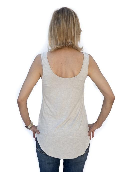 Take a look at our Oatmeal Rayon Modal Knit Tank Top Made out of a super soft rayon modal fabric Fabric content: 95% rayon modal, 5% spandex Color: Oatmeal Semi loose body with sides slightly shorter than front and back Straps are wide enough to wear a bra Round neck in front and back Back length is longer than front measuring at 21" Lightweight Casual Summer Tops, Comfortable Stretch Soft Knit Tops, Versatile Beige Cotton Tank Top, Fitted Modal Casual Tank Top, Fitted Casual Modal Tank Top, Versatile Soft Knit Stretch Tops, Spring Everyday Rayon Tops, Lightweight Casual Spring Tops, Casual Stretch Viscose Tank Top