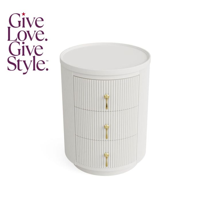 a white cabinet with gold handles and knobs on the front, next to a give love style sticker