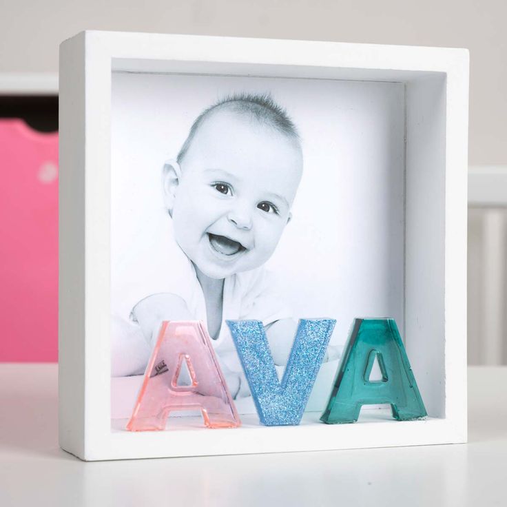 a baby's name is placed next to the letters that spell out, ava