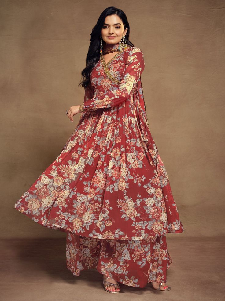 Indulge in the timeless allure of our ravishing red chiffon suit, adorned with exquisite floral print, zari work, and sequin detailing. This ensemble encapsulates the essence of elegance and sophistication, with its vibrant red hue and delicate embellishments. Crafted from high-quality chiffon material, it offers a luxurious feel and a flattering drape, ensuring both comfort and style.
Accompanying this stunning suit is a matching chiffon palazzo, intricately designed with floral print work to c Engagement Gown, Chiffon Suit, Lehenga Crop Top, Floral Lehenga, Lehenga Choli Wedding, Party Wear Lehenga Choli, Reception Gown, Bollywood Lehenga, Cocktail Wear