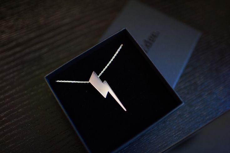 Flat Top Lightning Bolt Pendant in sterling silver | Edge Only jewelry Lightning Bolt Necklace, Hand Piercing, Dublin Castle, Lightning Bolt Earrings, Paper Boxes, Large Necklace, Silver Flats, Gold Flats, Luxury Paper