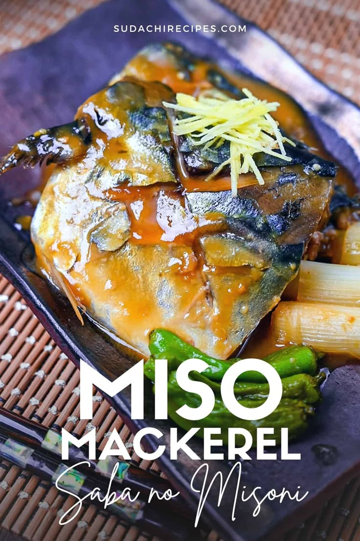 a plate with pasta, asparagus and sauce on it that says miso mackerel