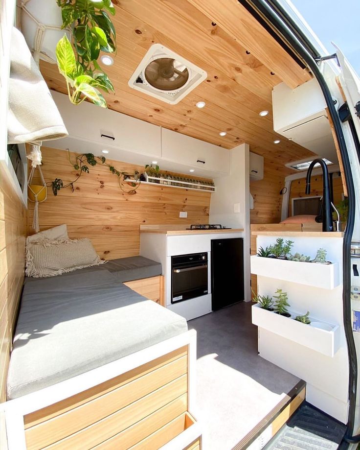 the interior of an rv with wood paneling