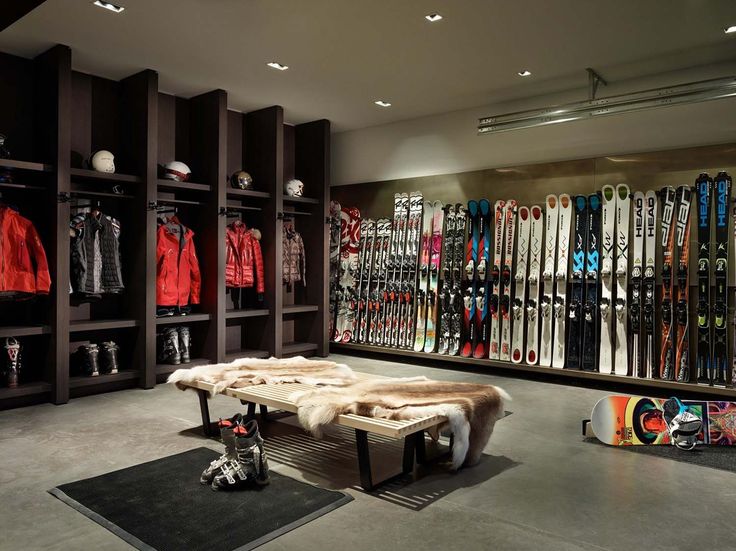 a ski shop with lots of snowboards on display