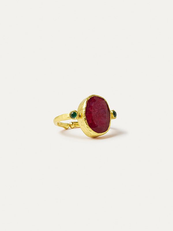 Let your fingers take center stage with this captivating red stone ring. Crafted with an adjustable gold band, this cocktail ring is hand-set with an oval shaped ruby semi-precious stone and petite green cubic zirconia gems. Modern Harry Potter, Ruby Cocktail, Aegon Ii Targaryen, Hand Jewelry Rings, Aemond Targaryen, Red Stone Ring, Friendship Rings, Evil Eye Ring, Ring Stack