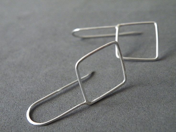 "I'd never guessed I could love geometry so much! My geometric collection is enriched by these sterling silver square earrings, lovingly handmade using silver wire. Minimalist and comfortable, are a great piece of jewelry to add style and edge to your look. Original gift idea for someone special! Measures/Details - earrings height 1.4 inches (3.5 cm) - square measures 0.6 by 0.6 inches (1.5 x 1.5 cm) All my pieces are carefully handmade. Irregularities and imperfection are signs of authenticity. Contemporary Square Jewelry For Gifts, Minimalist Silver Square Jewelry, Square Nickel-free Earrings For Everyday, Sterling Silver Paperclip Earrings As Gift, Minimalist Silver Rectangular Earrings, Everyday Square Nickel-free Earrings, Geometric Sterling Silver Earrings With Ear Wire, Sterling Silver Geometric Earrings With Ear Wire, Modern Sterling Silver Square Jewelry