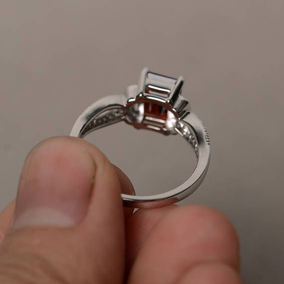 Red Garnet Ring Emerald Cut Engagement Ring Anniversary Gift Luxury Emerald Cut Ruby Promise Ring, Ruby Ring With Radiant Cut Center Stone For Gift, Elegant Emerald Cut Ruby Promise Ring, Silver Emerald Ring For Promise With Radiant Cut, Elegant Silver Sapphire Ring With Emerald Cut, Elegant Emerald-cut Solitaire Ruby Ring, Silver Radiant Cut Emerald Ring, Elegant Radiant Cut Birthstone Ring As Gift, Radiant Cut Silver Emerald Ring