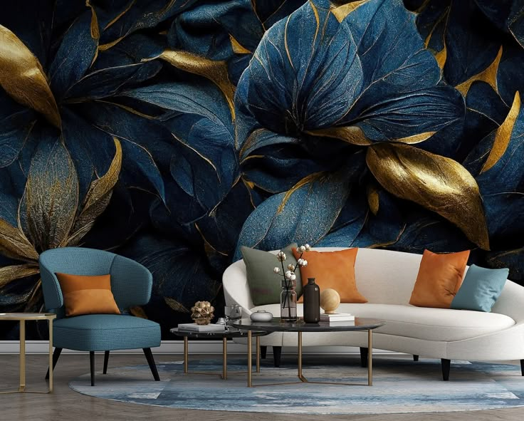 a living room with blue and gold leaves on the wall