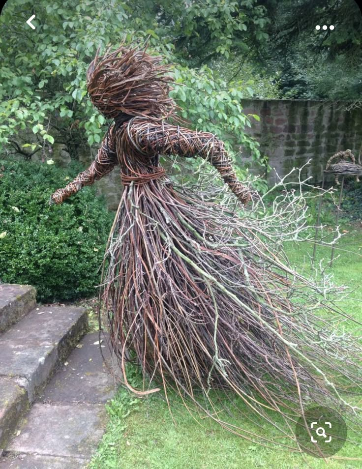 a sculpture made out of branches and twigs