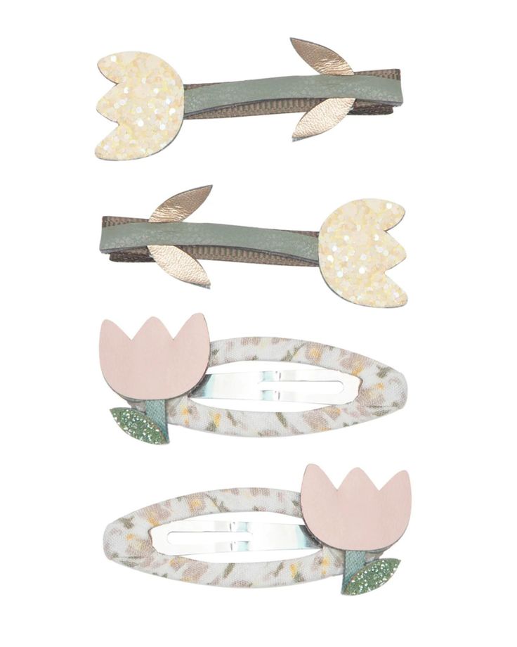 These sweet little tulip clips, crafted from soft leatherette pastel and glitter fabrics are just perfect for adding some spring time fun to everyday outfits! 4 in a pack 2 x 5cm ribbon wrapped clic clac clips 2 x grosgrain ribbon wrapped alligator clips Warning! Not suitable for children under 36 months