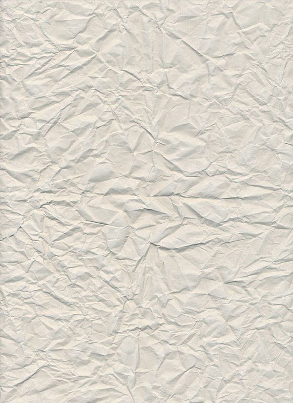 an image of white paper textured on the wall